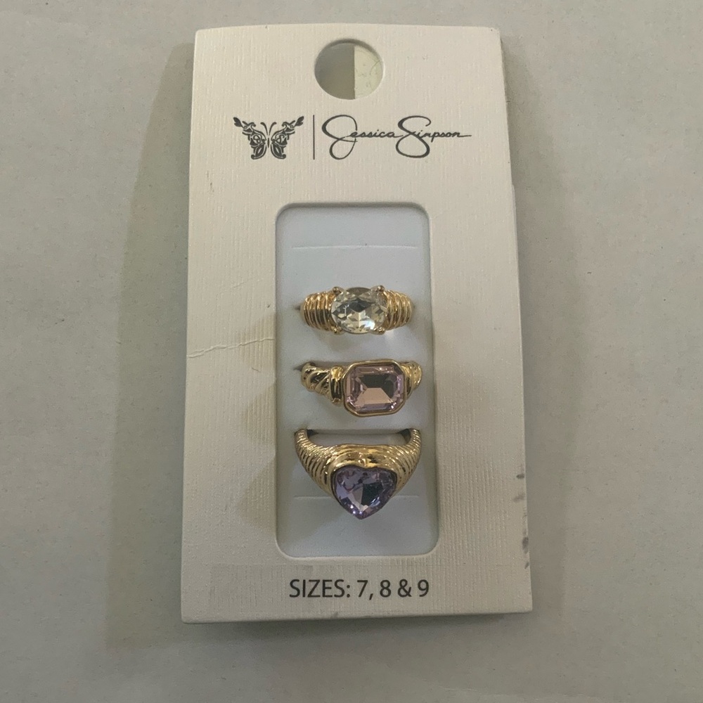 Jessica Simpson Gold Ring Trio with Clear, Light Pink and Lavender Stones